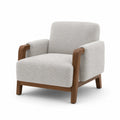 Fauteuil en tissu bouclé gris clair avec cadre en bois massif