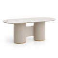 Table à manger ovale en marbre composite blanc et beige avec pieds en bois